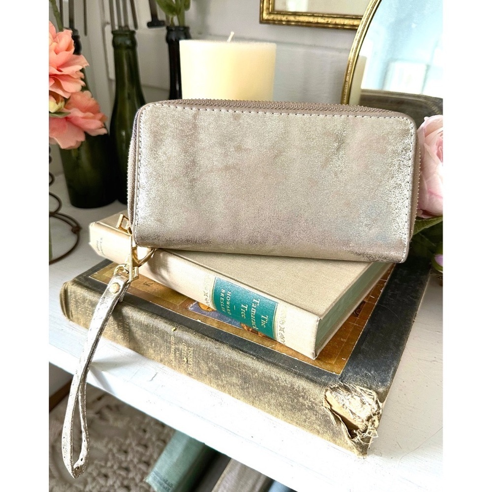 Brand new Maurice’s gold shimmery wallet